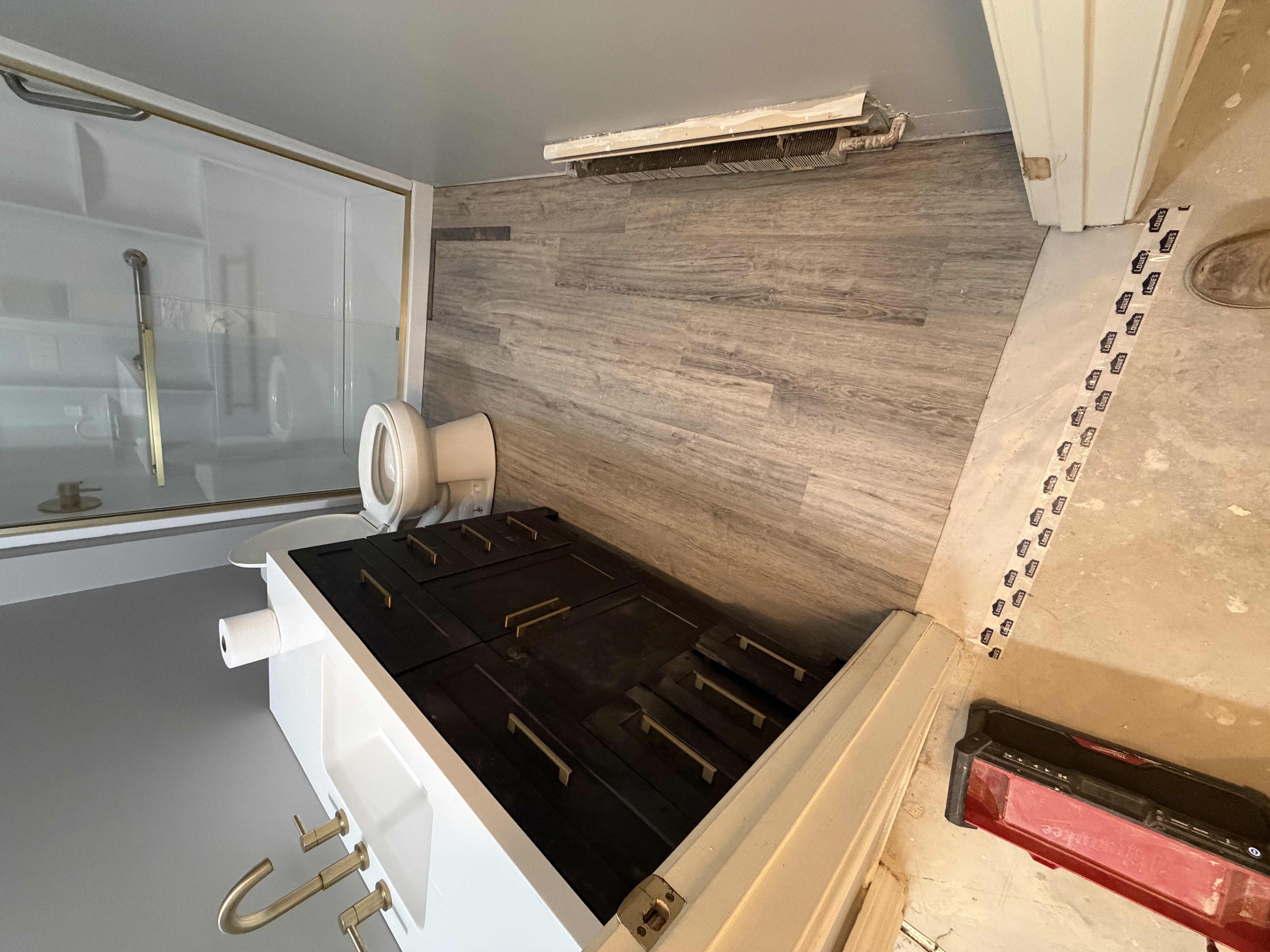 Bathroom remodel LVP flooring vanity shower NH