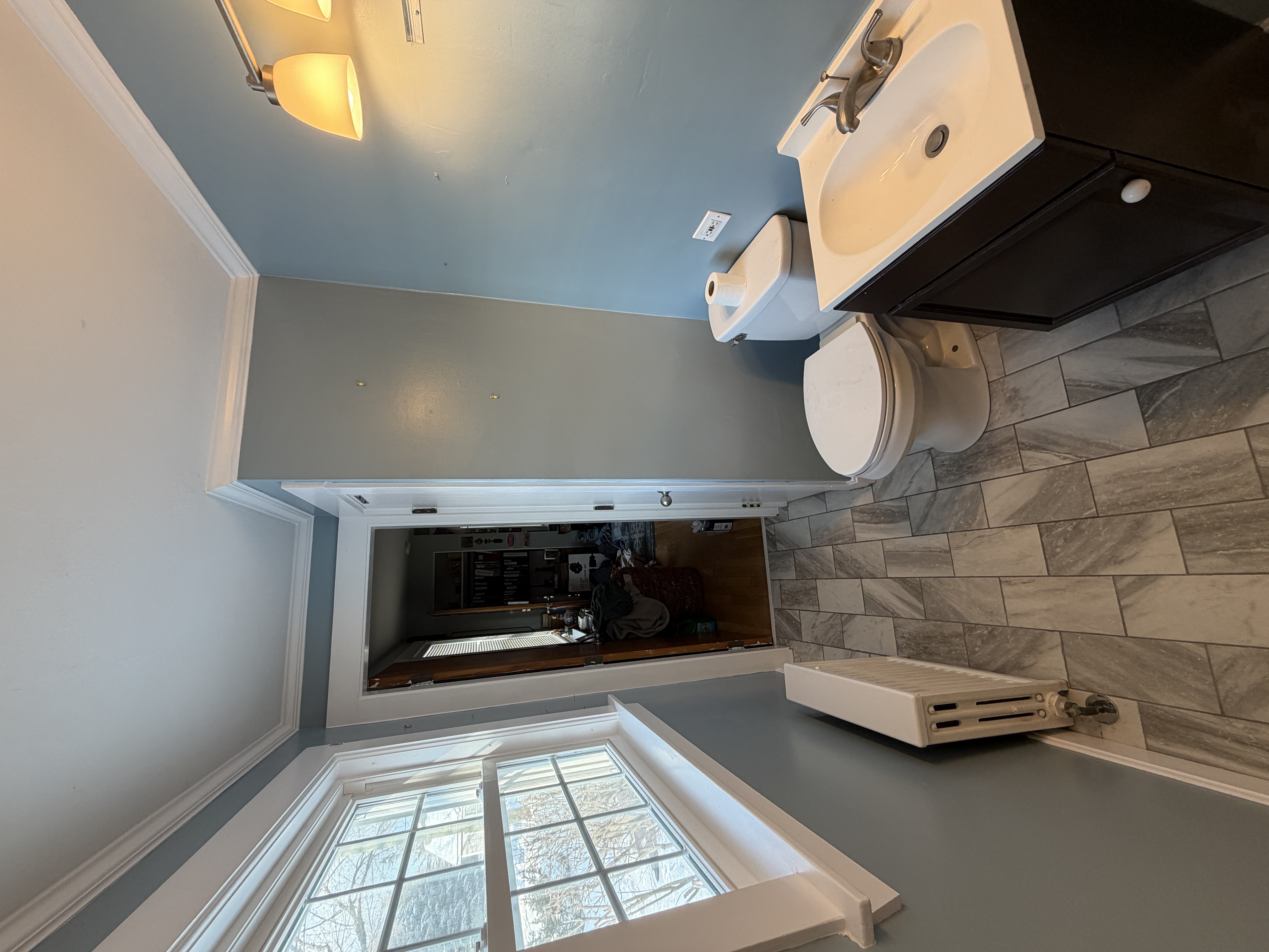 Bathroom remodel tile floor vanity crown molding NH